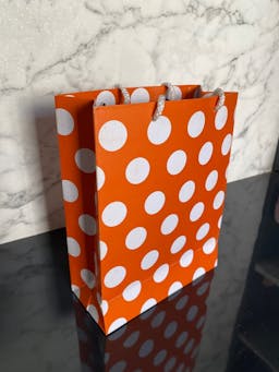 Paper thamboolam bag - orange_dotted_2